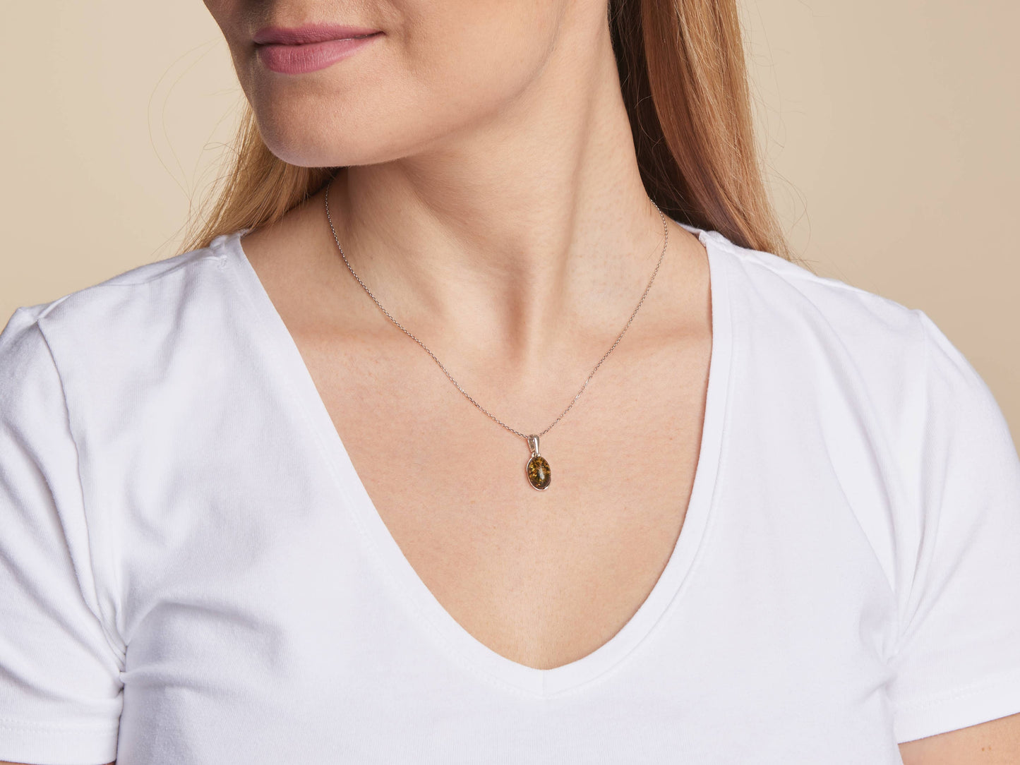 Oval green amber pendant, 925 sterling silver