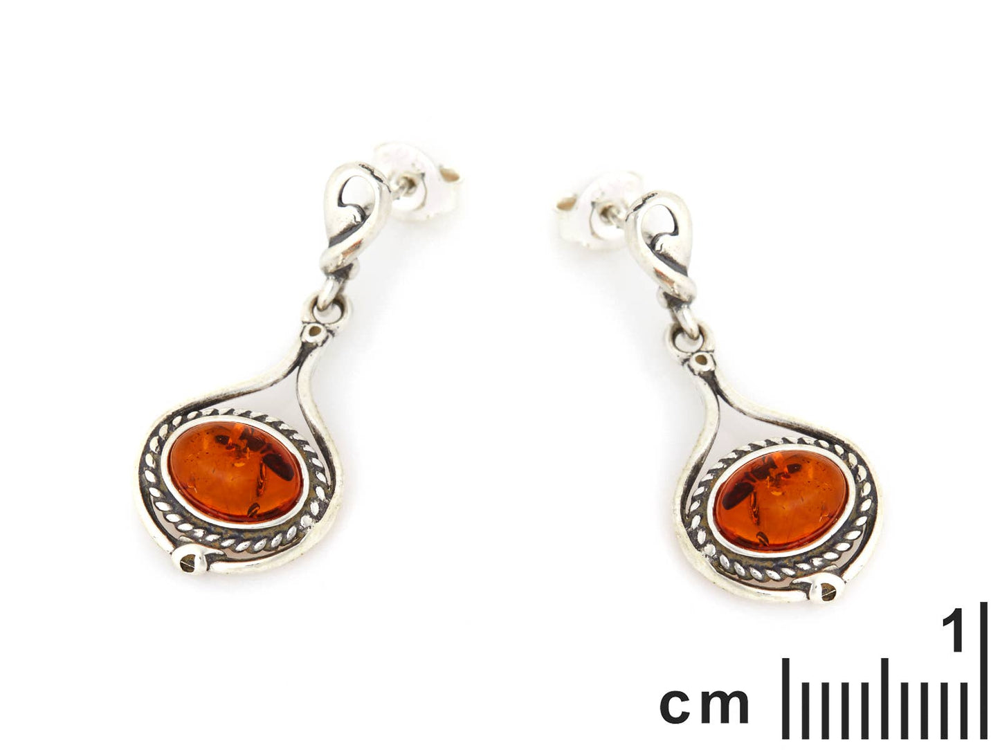 Earrings made of cognac-colored amber, aged silver