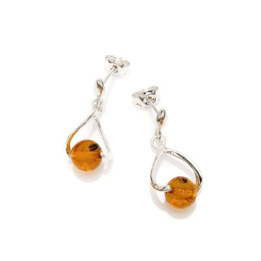 Cognac-colored ball earrings made of amber and sterling silver