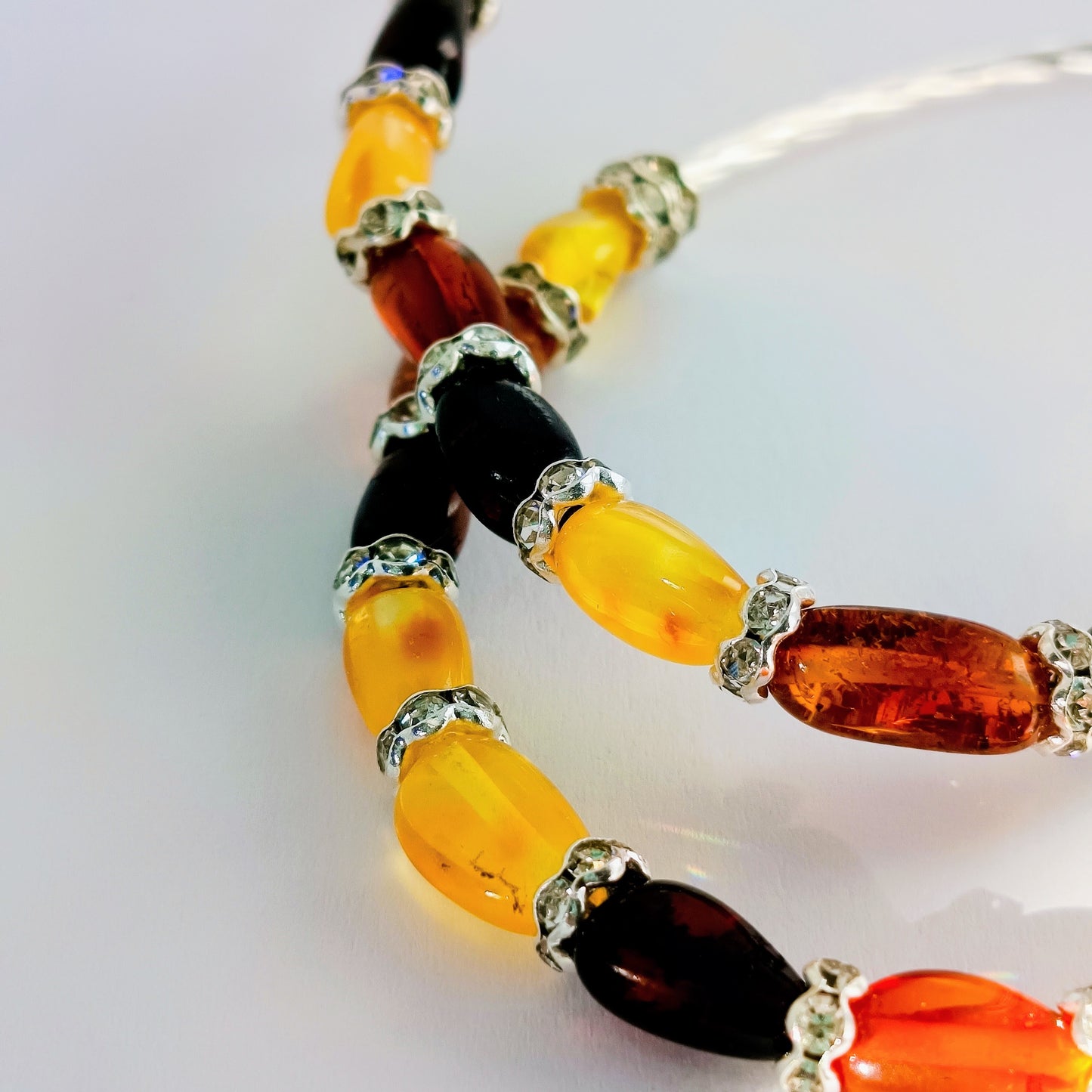 Amber bracelet with zirconia applications