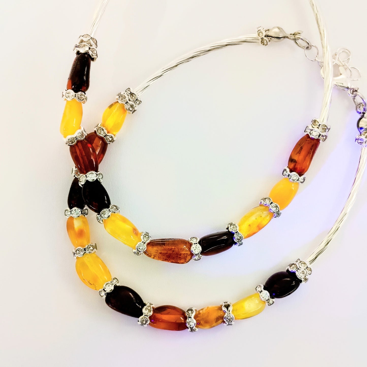 Amber bracelet with zirconia applications