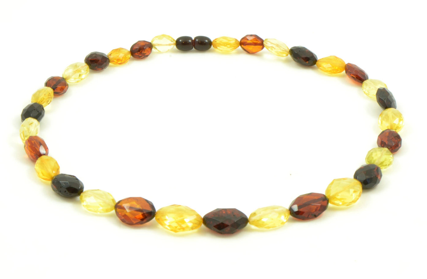 Large faceted set of multicolored amber in olive shape