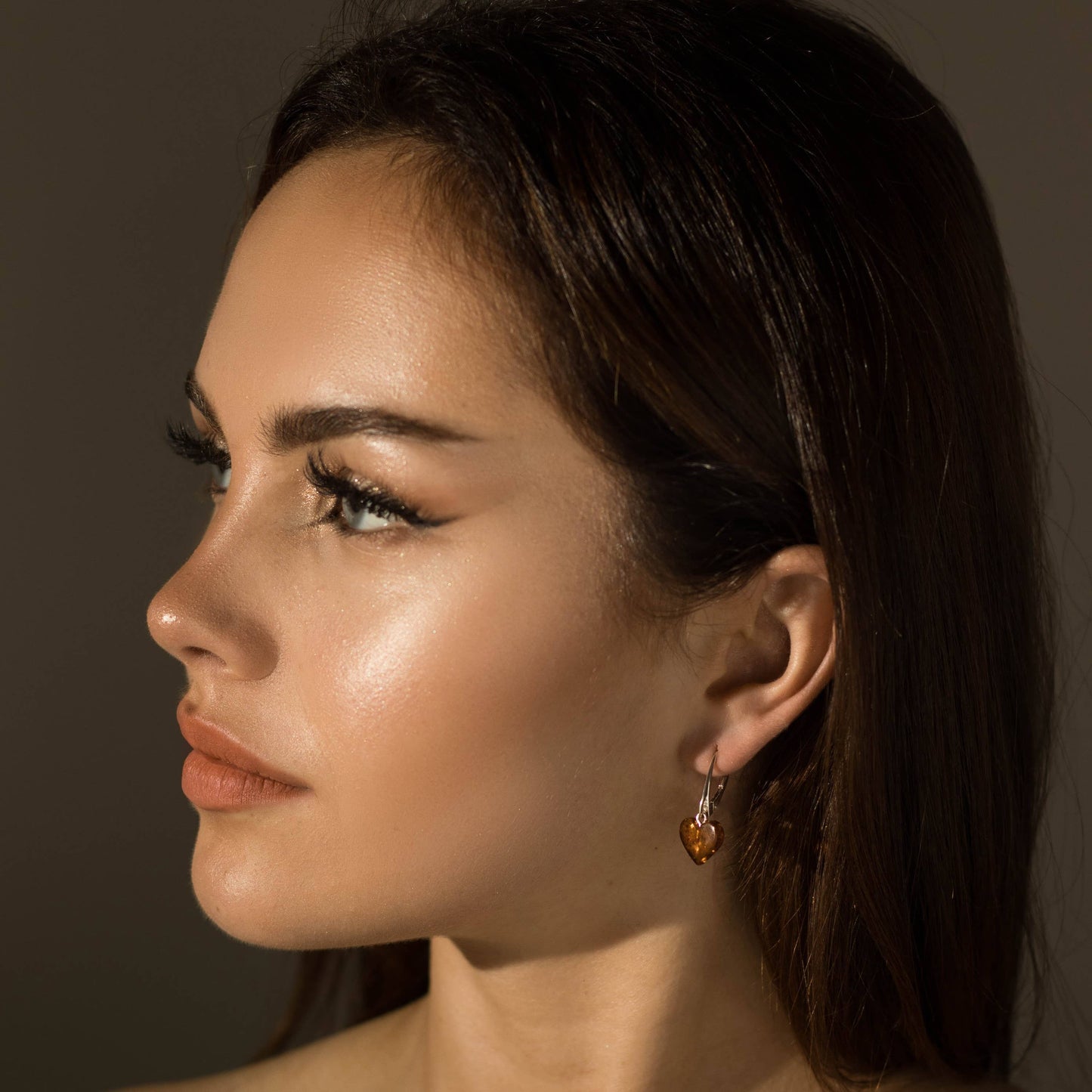 Cognac Baltic amber heart-shaped earrings, 925 silver