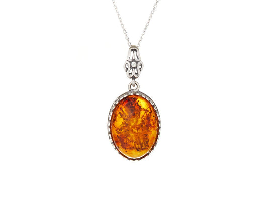 Oval cognac amber pendant, antique silver 925, 2+1 cm