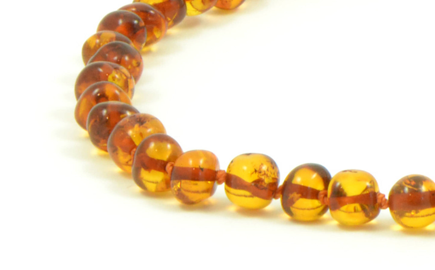polished amber bead necklace, cognac