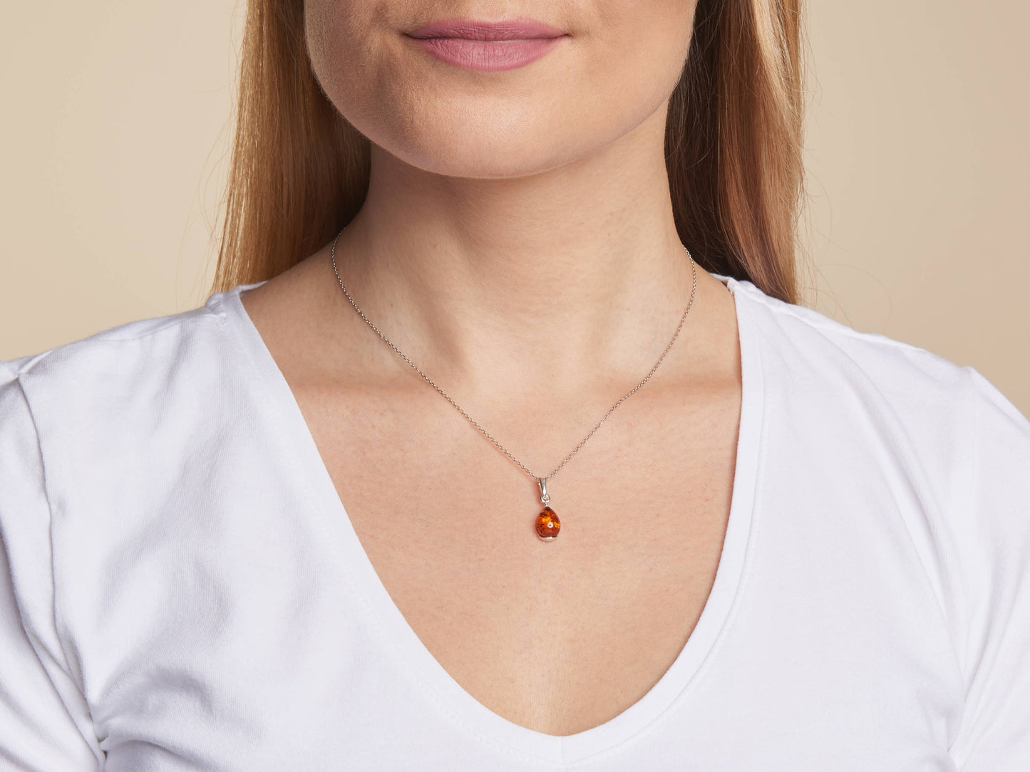 Cognac drop pendant made of amber