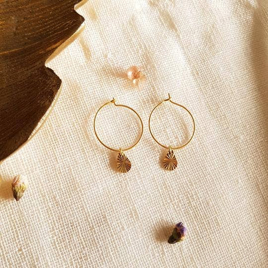 Boucles d'oreilles, Tyfen